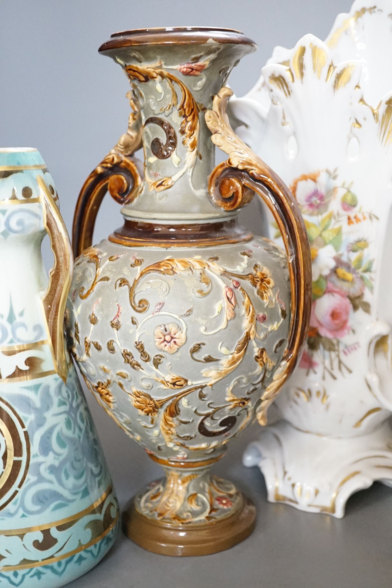 Four pairs of continental porcelain vases including a pair of Wilhelm Schiller & Sons vases